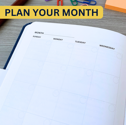 Open planner page showing a blank monthly calendar layout with space for each day. The label reads, Plan Your Month.